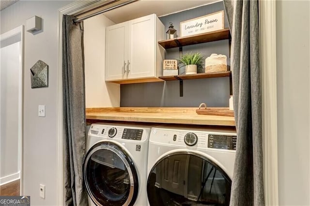 1361 Chatley Way, Woodstock, GA 30188 - laundry room featuring washing machine and clothes dryer and cabinet space