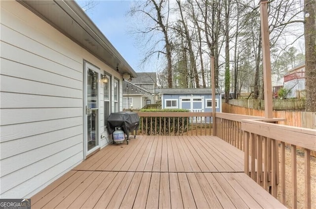 1361 Chatley Way, Woodstock, GA 30188 - wooden terrace with area for grilling and an outdoor structure