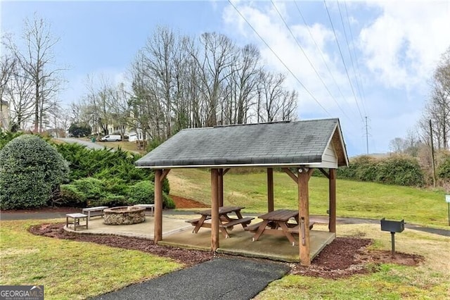 1361 Chatley Way, Woodstock, GA 30188 - view of property's community featuring a fire pit, a lawn, a gazebo, and a patio