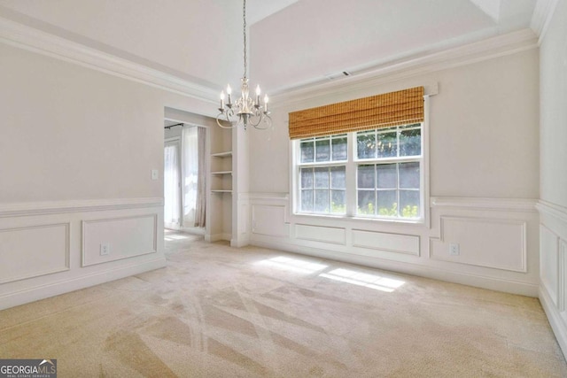 154 Ashebrooke Way, Jefferson, GA 30549 - carpeted empty room with a chandelier, crown molding, a decorative wall, and a wainscoted wall