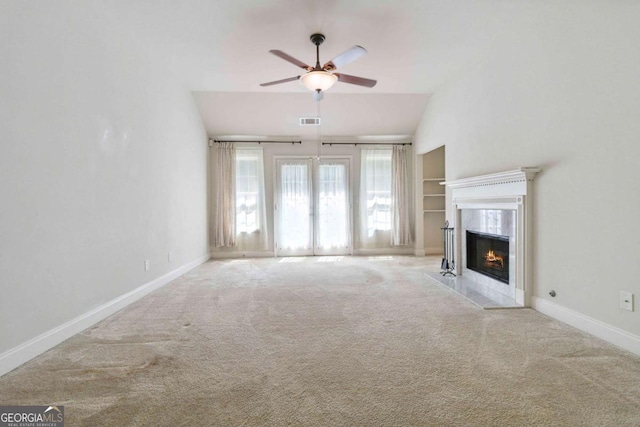 154 Ashebrooke Way, Jefferson, GA 30549 - unfurnished living room with a ceiling fan, carpet floors, a premium fireplace, built in features, and vaulted ceiling