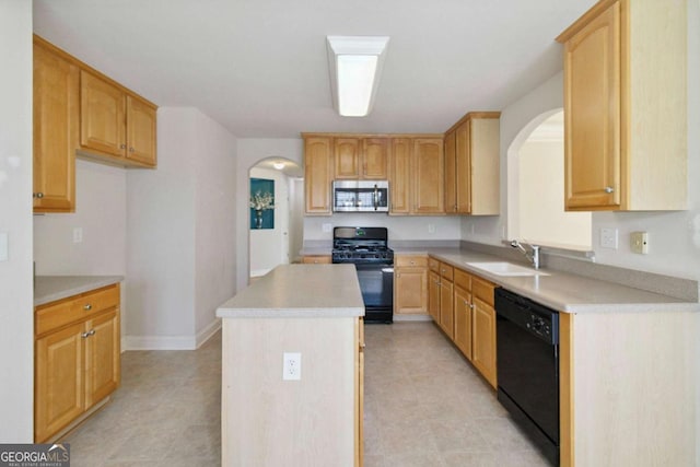 154 Ashebrooke Way, Jefferson, GA 30549 - kitchen featuring black appliances, arched walkways, a kitchen island, and light countertops