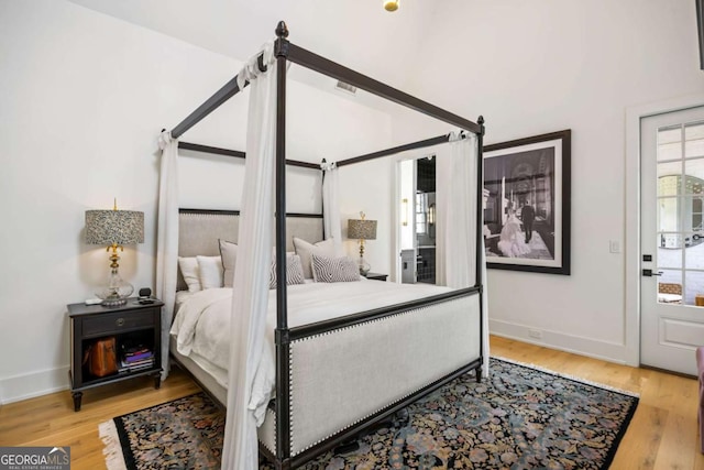 11277 Serenbe Ln, Chattahoochee Hills, GA 30268 - bedroom featuring wood finished floors