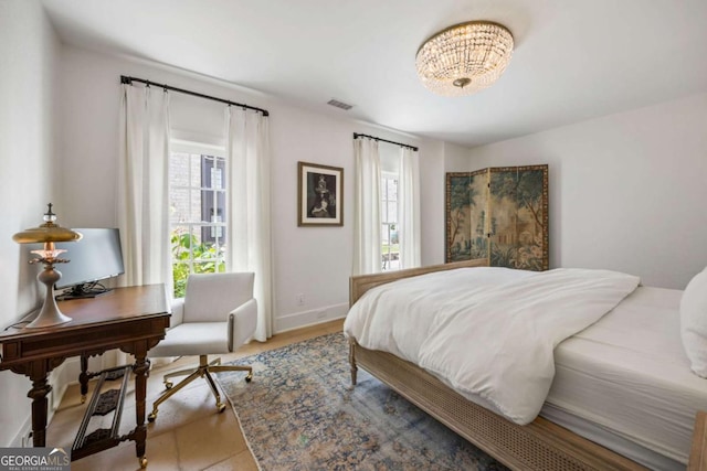 11277 Serenbe Ln, Chattahoochee Hills, GA 30268 - bedroom with a chandelier and a desk