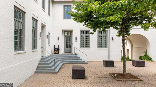 11277 Serenbe Ln, Chattahoochee Hills, GA 30268 - doorway to property with brick siding