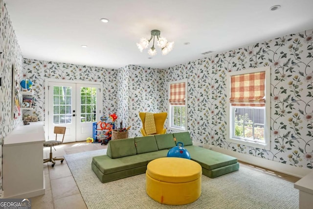 11277 Serenbe Ln, Chattahoochee Hills, GA 30268 - rec room featuring wallpapered walls, french doors, a chandelier, recessed lighting, and tile patterned flooring