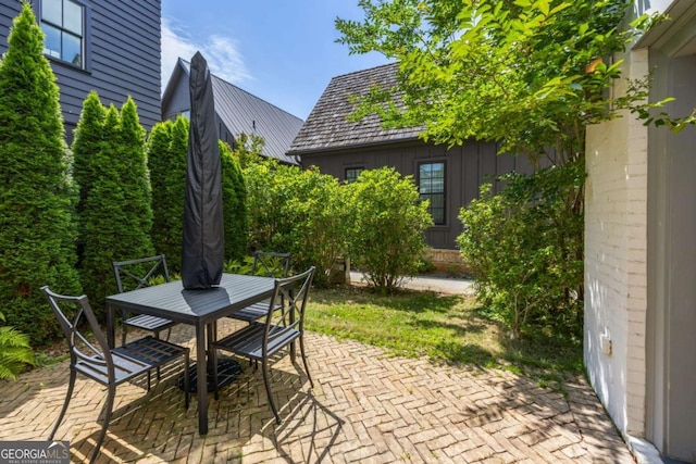 11277 Serenbe Ln, Chattahoochee Hills, GA 30268 - view of patio / terrace featuring outdoor dining space