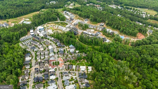 11277 Serenbe Ln, Chattahoochee Hills, GA 30268 - aerial overview of property's location with a heavily wooded area and nearby suburban area