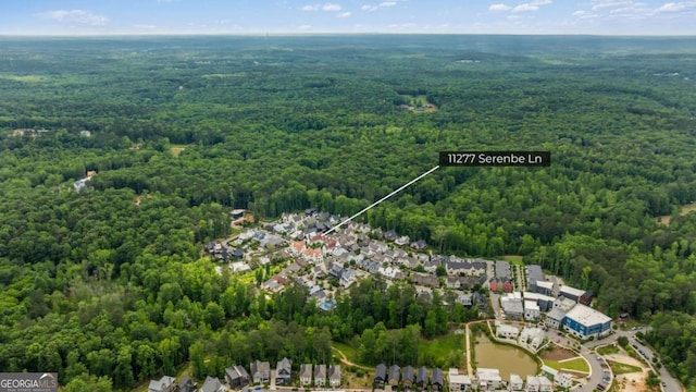 11277 Serenbe Ln, Chattahoochee Hills, GA 30268 - aerial view of property's location featuring a heavily wooded area