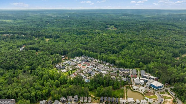 11277 Serenbe Ln, Chattahoochee Hills, GA 30268 - aerial view of property and surrounding area featuring a heavily wooded area
