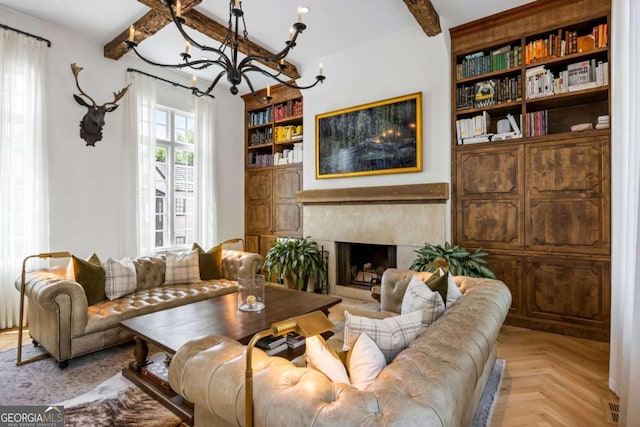 11277 Serenbe Ln, Chattahoochee Hills, GA 30268 - living area with a chandelier, beamed ceiling, a fireplace, and built in features
