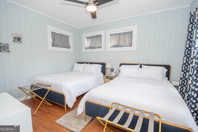 2200 3rd Ave, Opelika, AL 36801 - bedroom with wood finished floors, ornamental molding, and a ceiling fan