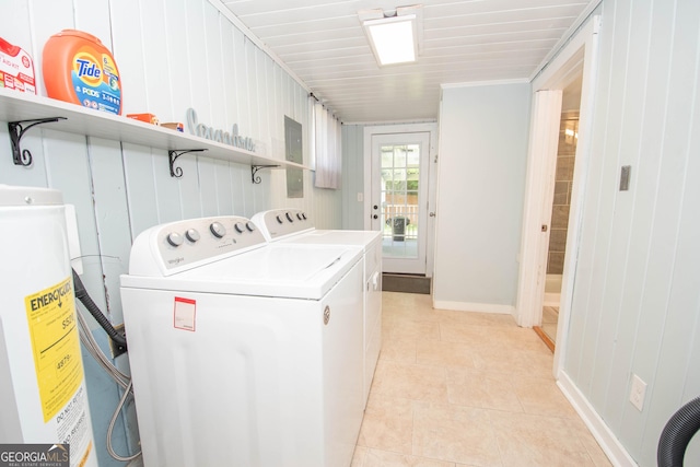 2200 3rd Ave, Opelika, AL 36801 - washroom featuring water heater, washer and clothes dryer, and light tile patterned floors