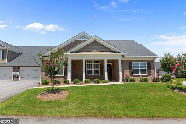 3209 Telhurst Way, Buford, GA 30519 - view of front of home featuring brick siding, a front lawn, a garage, driveway, and a shingled roof
