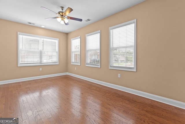 3209 Telhurst Way, Buford, GA 30519 - spare room featuring ceiling fan and wood finished floors