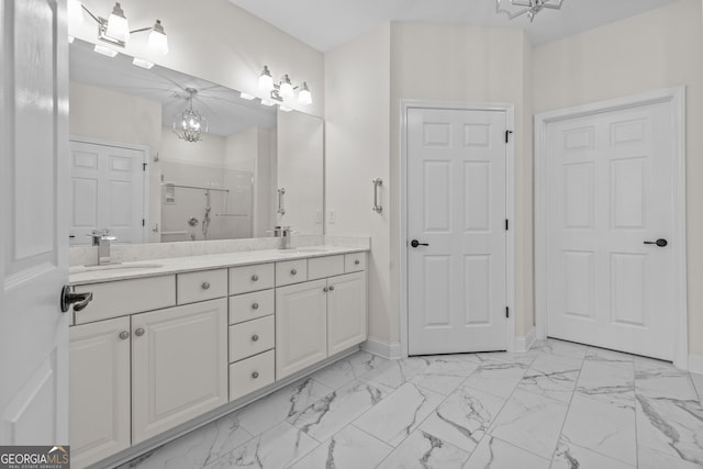 3209 Telhurst Way, Buford, GA 30519 - bathroom featuring a chandelier, a shower stall, double vanity, and marble finish floors