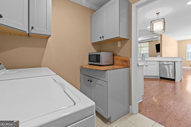 3209 Telhurst Way, Buford, GA 30519 - washroom with washer and dryer, cabinet space, recessed lighting, and light wood finished floors