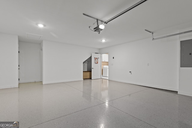 3209 Telhurst Way, Buford, GA 30519 - garage featuring electric panel, a garage door opener, and washer and dryer
