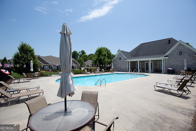3209 Telhurst Way, Buford, GA 30519 - community pool featuring a patio area