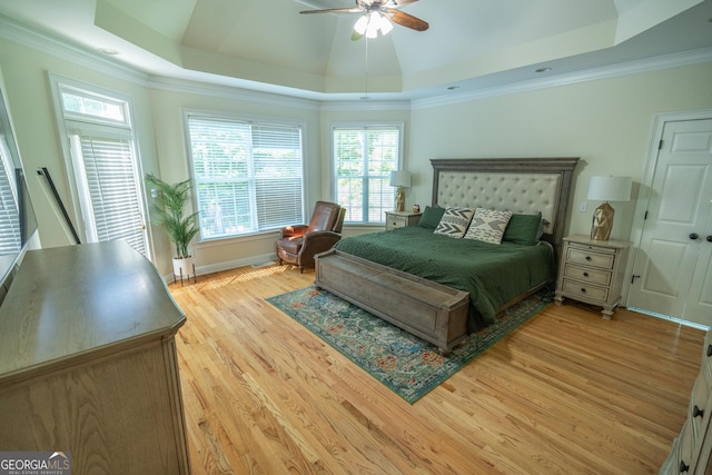 97 Windermere Cir, Newnan, GA 30265 - bedroom featuring a raised ceiling, light wood finished floors, crown molding, and ceiling fan