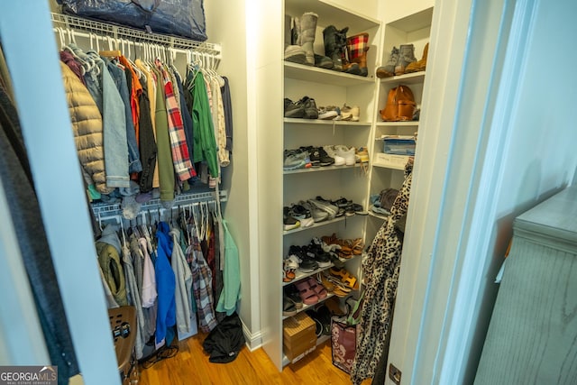 97 Windermere Cir, Newnan, GA 30265 - walk in closet featuring wood finished floors