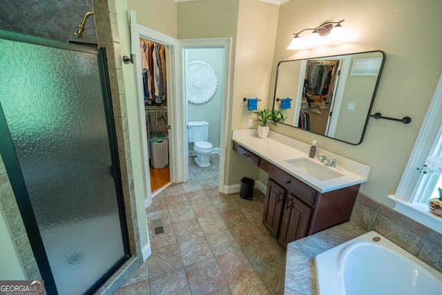97 Windermere Cir, Newnan, GA 30265 - bathroom featuring a stall shower, vanity, a spacious closet, and a bath