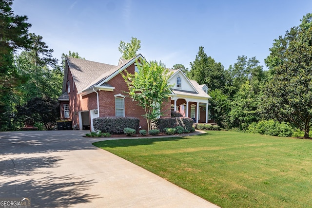 97 Windermere Cir, Newnan, GA 30265 - view of front of home featuring a garage, brick siding, concrete driveway, and a front yard