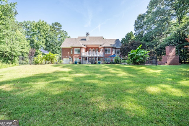 97 Windermere Cir, Newnan, GA 30265 - back of property featuring a chimney and brick siding