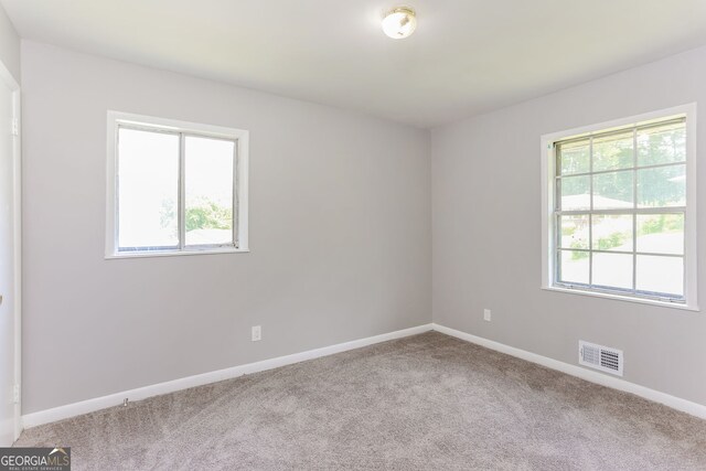 4133 Conley Cir, Conley, GA 30288 - carpeted empty room with baseboards