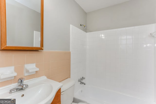 4133 Conley Cir, Conley, GA 30288 - full bath featuring shower / tub combination, vanity, and tile walls