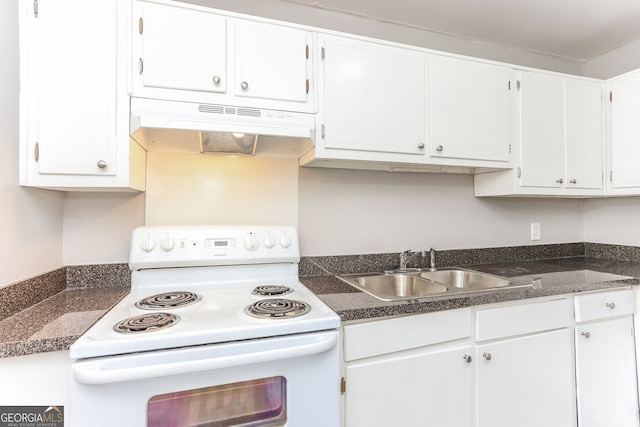 4133 Conley Cir, Conley, GA 30288 - kitchen featuring white electric stove, under cabinet range hood, white cabinets, and dark countertops