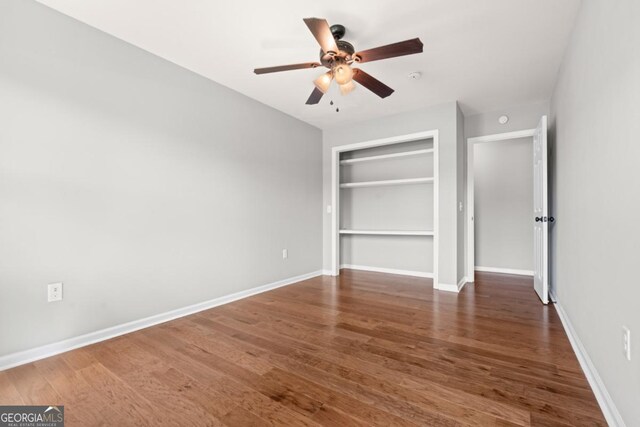 1501 Cayla Way, Statesboro, GA 30458 - unfurnished bedroom with wood finished floors, a closet, and ceiling fan
