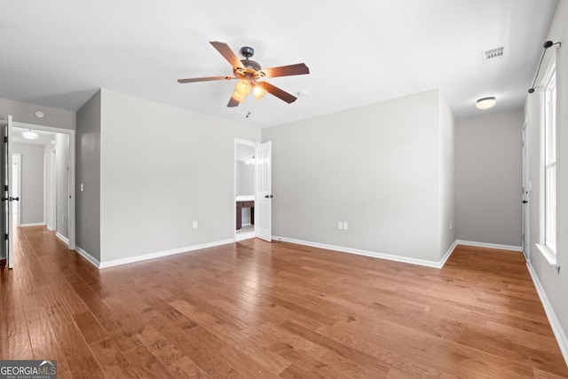 1501 Cayla Way, Statesboro, GA 30458 - unfurnished living room with ceiling fan and light wood-style floors