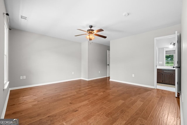 1501 Cayla Way, Statesboro, GA 30458 - unfurnished living room with a ceiling fan and light wood finished floors