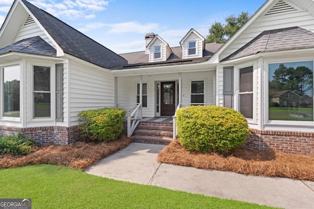 1501 Cayla Way, Statesboro, GA 30458 - view of front of home featuring covered porch, roof with shingles, and a chimney