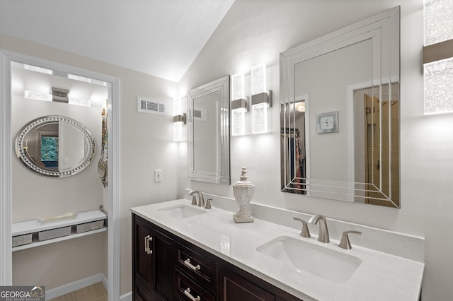 5719 High Harbor Ct, Gainesville, GA 30504 - full bathroom with double vanity and lofted ceiling
