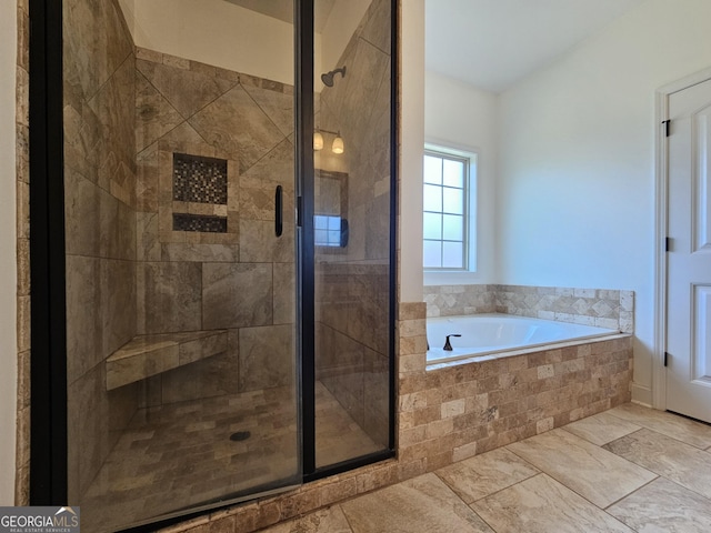 303 Norfolk Cir, Warner Robins, GA 31088 - bathroom featuring a stall shower and a bath
