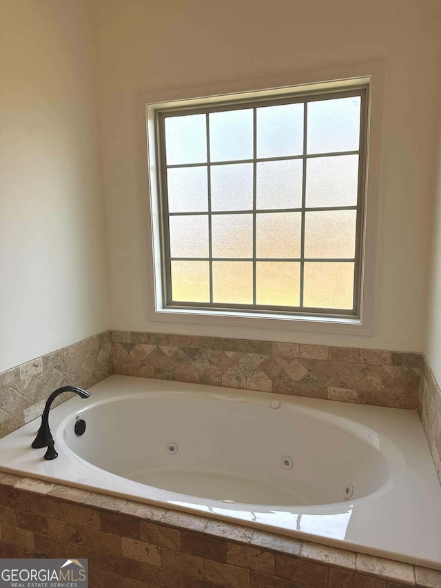 303 Norfolk Cir, Warner Robins, GA 31088 - full bathroom with a jetted tub and plenty of natural light