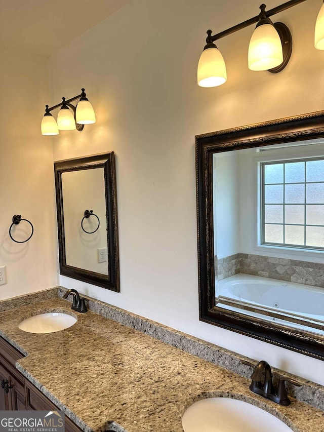 303 Norfolk Cir, Warner Robins, GA 31088 - full bathroom with double vanity and a whirlpool tub