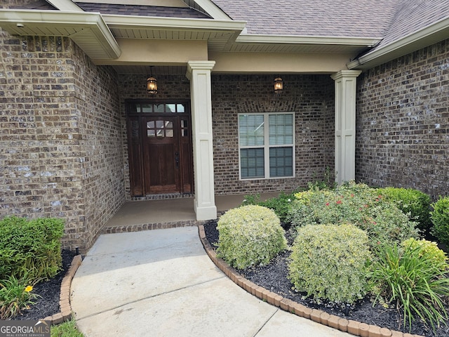 303 Norfolk Cir, Warner Robins, GA 31088 - entrance to property featuring brick siding and a shingled roof