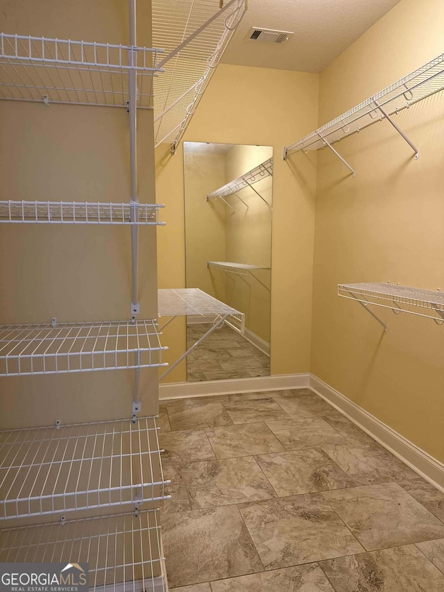 303 Norfolk Cir, Warner Robins, GA 31088 - view of walk in closet