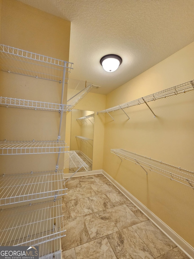 303 Norfolk Cir, Warner Robins, GA 31088 - view of walk in closet