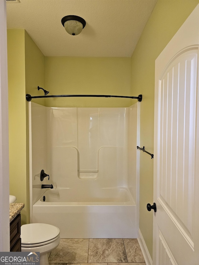 303 Norfolk Cir, Warner Robins, GA 31088 - full bath with vanity, shower / tub combination, and a textured ceiling