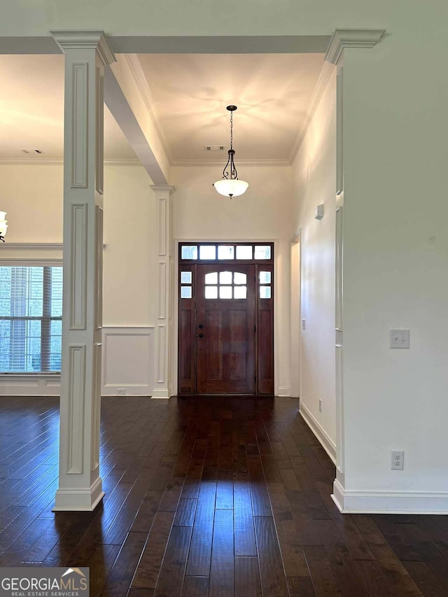 303 Norfolk Cir, Warner Robins, GA 31088 - foyer entrance featuring ornate columns, dark wood-style flooring, and ornamental molding