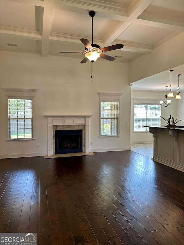 303 Norfolk Cir, Warner Robins, GA 31088 - unfurnished living room featuring coffered ceiling, a fireplace, a ceiling fan, dark wood-style flooring, and beam ceiling