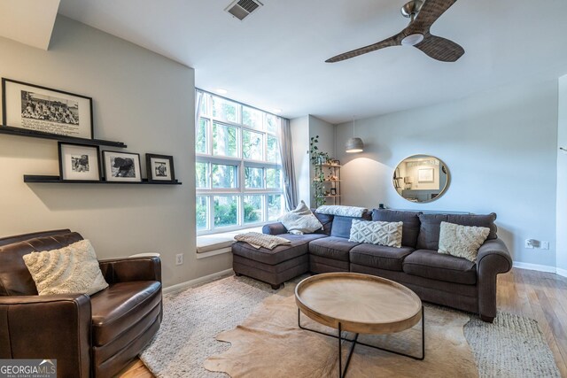 1192 Cleburne Ave NE, Atlanta, GA 30307 - living room featuring wood finished floors and a ceiling fan