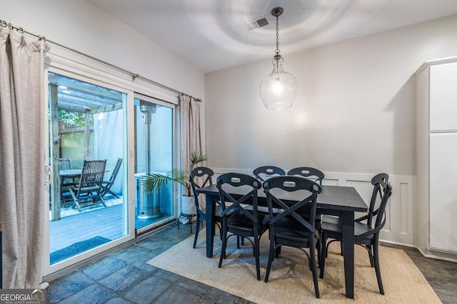 1192 Cleburne Ave NE, Atlanta, GA 30307 - dining room with a wainscoted wall and a decorative wall