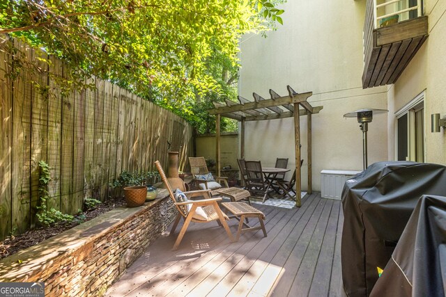 1192 Cleburne Ave NE, Atlanta, GA 30307 - wooden deck with outdoor dining area, a pergola, a fenced backyard, and grilling area