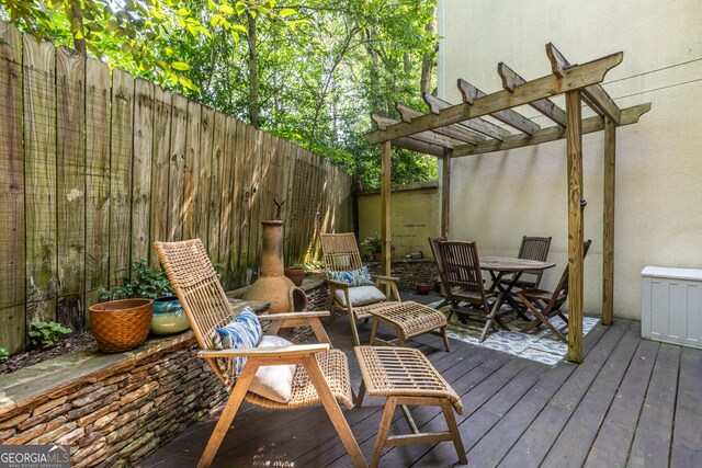 1192 Cleburne Ave NE, Atlanta, GA 30307 - wooden terrace featuring a pergola and outdoor dining area