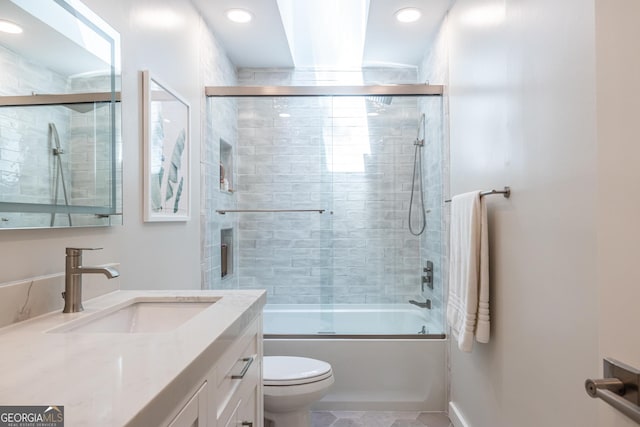 1192 Cleburne Ave NE, Atlanta, GA 30307 - full bathroom with vanity, bath / shower combo with glass door, tile patterned flooring, and recessed lighting